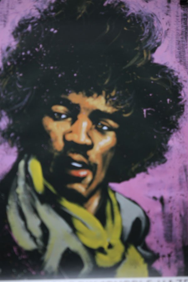 JIMI HENDRIX PURPLE HAZE: JIMI HENDRIX PURPLE HAZE **|**|** 11X17INCHES; UNFRAMED; This poster is of Purple Haze, by David Garibaldi, from his Rhythm and Hue collection. It shows a portrait of Jimi Hendrix.David Garibaldi (bor