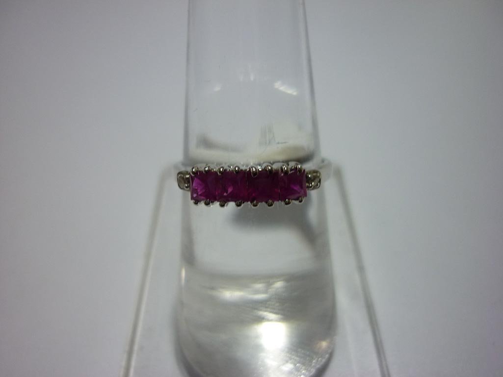 14.00 CTW RUBY & DIAMOND RING .925 STERLING SILVER: 14.00 CTW RUBY & DIAMOND RING .925 STERLING SILVER **|**|** 14.00 CTW RUBY & DIAMOND RING .925 STERLING SILVER ; STONE WEIGHT 0.75 CTW ; DIAMOND WEIGHT 0.03 CTW ; MSRP: $250