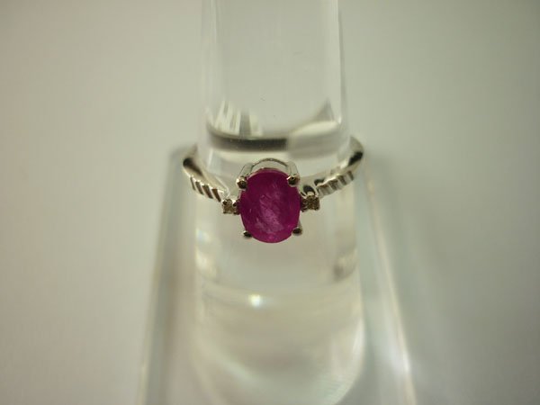 9.25 CTW RUBY AND DIAMOND RING .925 STERLING SILVER: 9.25 CTW RUBY AND DIAMOND RING .925 STERLING SILVER **|**|** 9.25 CTW RUBY AND DIAMOND RING .925 STERLING SILVER; RUBY WEIGHT 1.04 CTW, DIAMOND WEIGHT 0.02 CTW ; MSRP: $225