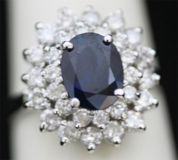 14K GOLD OVAL BLUE SAPPHIRE AND DIAMOND RING: 14K GOLD OVAL BLUE SAPPHIRE AND DIAMOND RING **|**|** 14K GOLD OVAL BLUE SAPPHIRE AND DIAMOND RING; MAINSTONE 2.04 CTW; DIAMOND 1.6 CTW; GOLD 14K WHITE 5.25 GRAMS