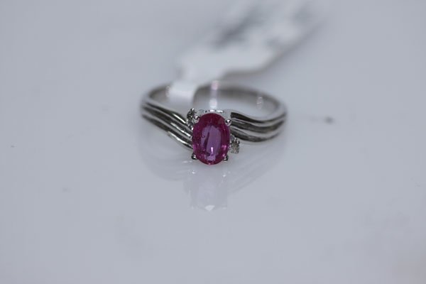 11.60 CTW RUBY AND DIAMOND RING .925 STERLING SILVER: 11.60 CTW RUBY AND DIAMOND RING .925 STERLING SILVER **|**|** 11.60 CTW RUBY AND DIAMOND RING .925 STERLING SILVER; RUBY WEIGHT 0.79 CTW; DIAMOND WEIGHT 0.02 CTW ; MSRP: $275