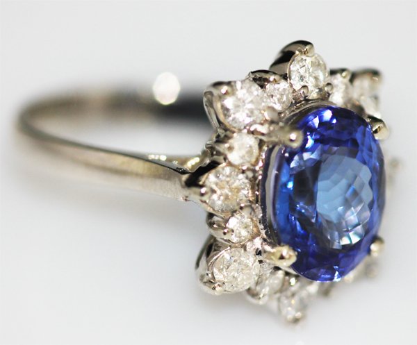 14K GOLD OVAL TANZANITE AND DIAMOND RING - 6