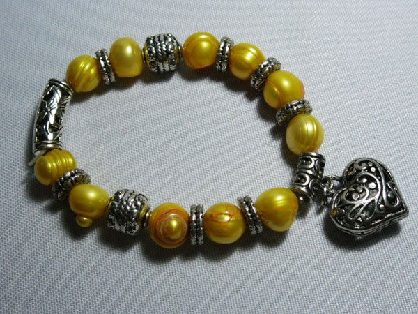 150CTW PHILIPPINE YELLOW PEARL HEART SILVER BRACELET: 150CTW PHILIPPINE YELLOW PEARL HEART SILVER BRACELET **|**|** 150CTW PHILIPPINE YELLOW PEARL HEART SILVER BRACELET