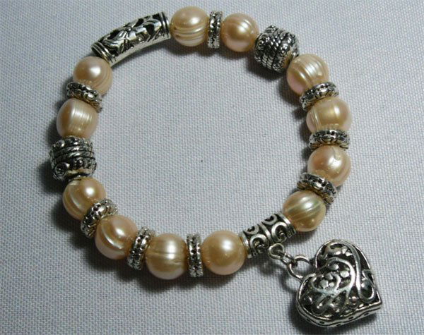 150CTW PHILIPPINE PEACH PEARL HEART SILVER BRACELET: 150CTW PHILIPPINE PEACH PEARL HEART SILVER BRACELET **|**|** 150CTW PHILIPPINE PEACH PEARL HEART SILVER BRACELET