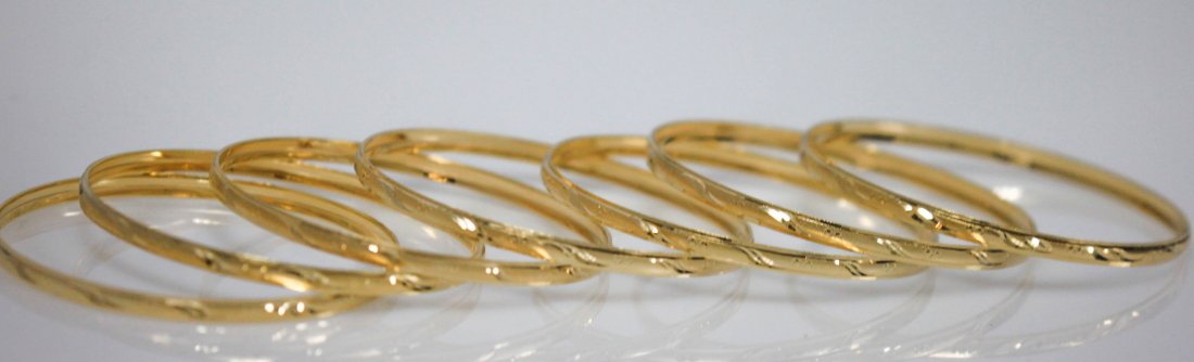14K GOLD PLATED BANGLES SET OF 7: 14K GOLD PLATED BANGLES SET OF 7 **|**|** 14K GOLD PLATED BANGLES SET OF 7