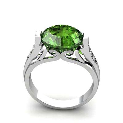 Genuine 5.09 ctw Emerald Ring 10k W/Y Gold: Genuine 5.09 ctw Emerald Ring 10k W/Y Gold **|**|** Total CTW: 5.09 ; Mainstone: Emerald ; Metal Purity: 10kt ; Metal: White or Yellow Gold 6.2 ; Diamond Count 1: 6 Round Cut ; Diamond CTW 1: 0.09 ; D
