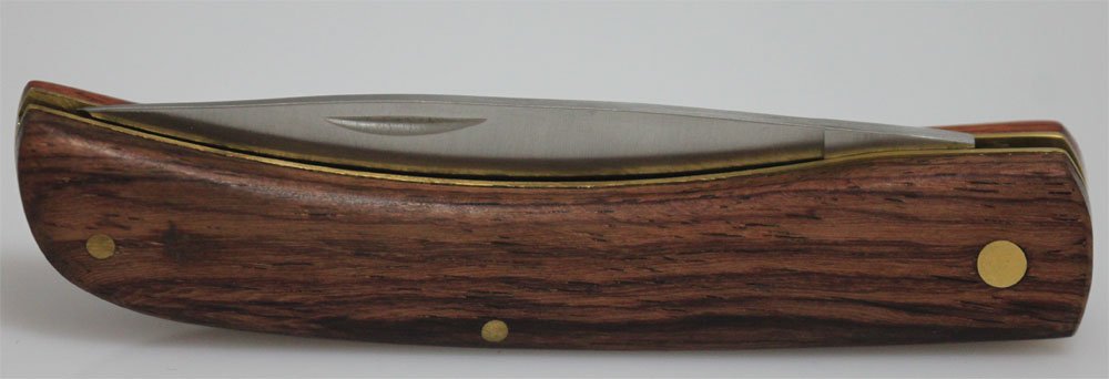 COLLECTORS EDITION ROSEWOOD HANDLE RITE MINER FOLDING K: COLLECTORS EDITION ROSEWOOD HANDLE RITE MINER FOLDING K **|**|** RITE MINER FOLDING KNIFE. 4" closed. Rosewood handle with bail. Boxed. Made by Rite Edge.