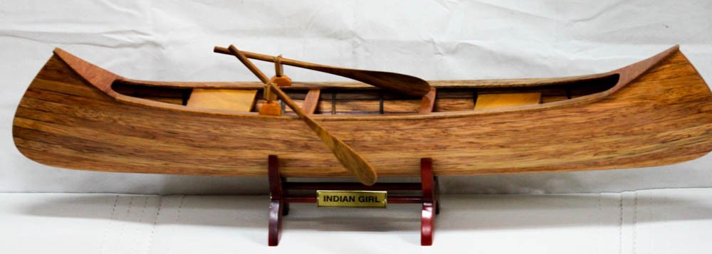 COLLECTORS EDITION HANDMADE INDIAN GIRL CANOE MODEL W/C: COLLECTORS EDITION HANDMADE INDIAN GIRL CANOE MODEL W/C **|**|** COLLECTORS EDITION HANDMADE INDIAN GIRL CANOE WOODEN MODEL W/COA The famous canoe designer/builder J. H. Rushton, introduced the Indian