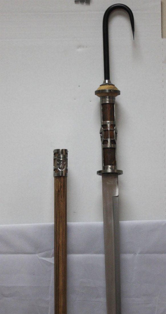 ANTIQUE STYLE COLLECTORS EDITION 41" PIRATE SWORD WITH: ANTIQUE STYLE COLLECTORS EDITION 41" PIRATE SWORD WITH **|**|** COMPLETE LENGTH 39" COMPLETE LENGTH W/SHEATH 41" BLADE LENGTH 24.5" HANDLE LENGTH W/HOOK 14.5" DETACHABLE HOOK CARBON STEEL SKULL IMAGE 