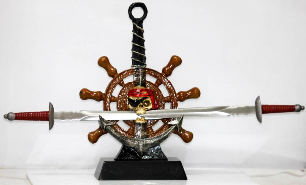 COLLECTORS EDITION PIRATES "HONOR TILL DEATH": COLLECTORS EDITION PIRATES "HONOR TILL DEATH" **|**|** COMES WITH STAND 3 DAGGERS A PIRATE SHIPS WHEEL. PERFECT DISPLAY PEACE