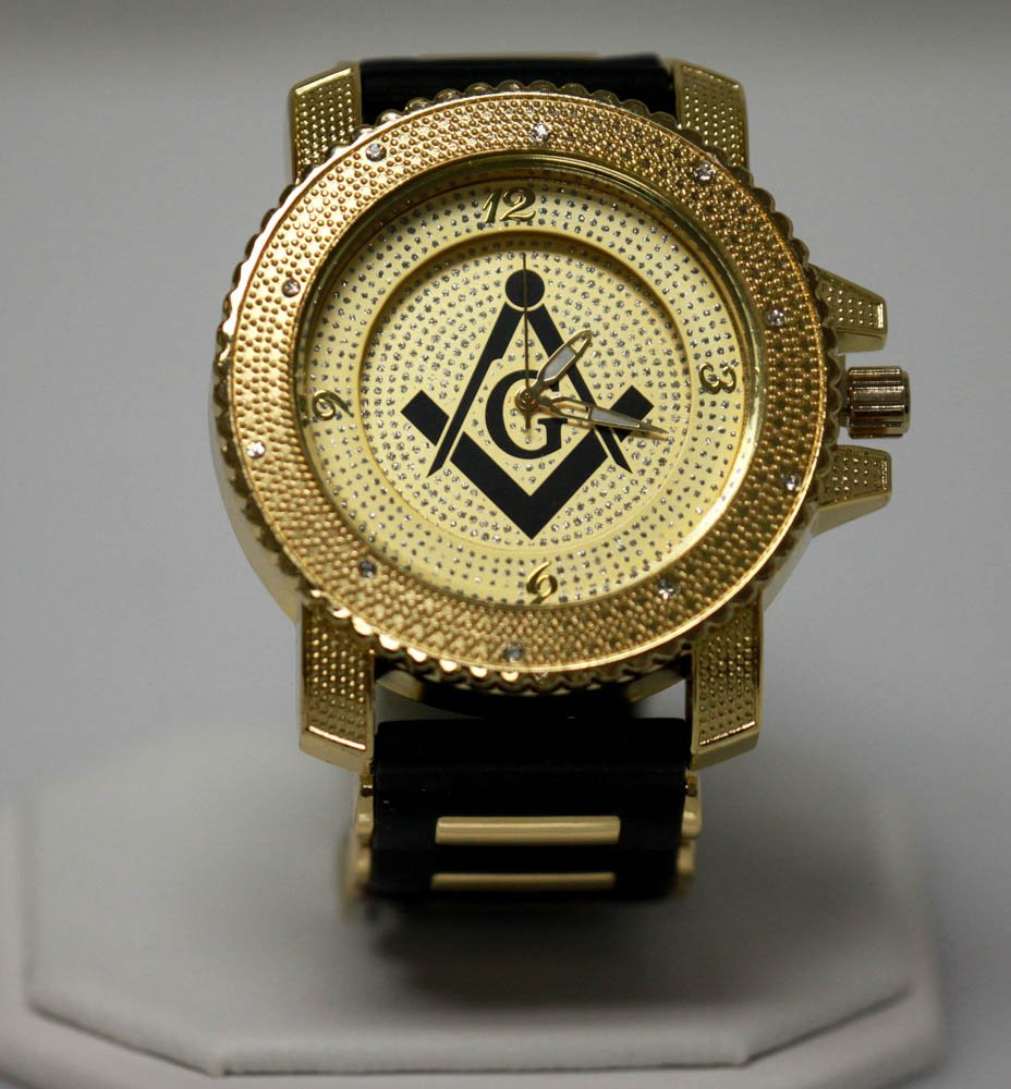 GOLD MASONIC WATCH WITH STUDDED SILVER AND BLACK STRAP: GOLD MASONIC WATCH WITH STUDDED SILVER AND BLACK STRAP **|**|** GOLD MASONIC WATCH WITH STUDDED SILVER AND BLACK RUBBER STRAP W/ BLACK MASONIC G SYMBOL