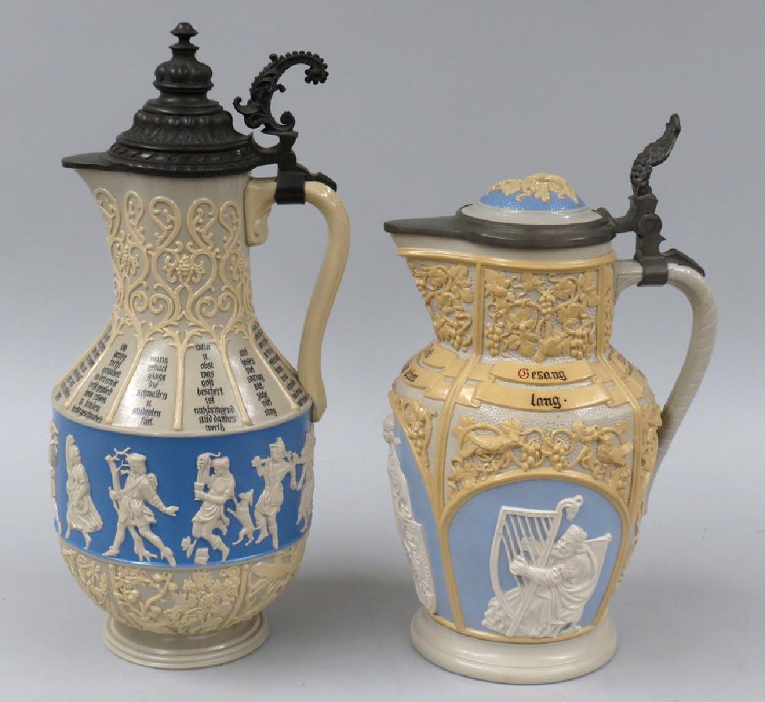(2) 19TH C. METTLACH LIDDED JUGS (1 of 2)