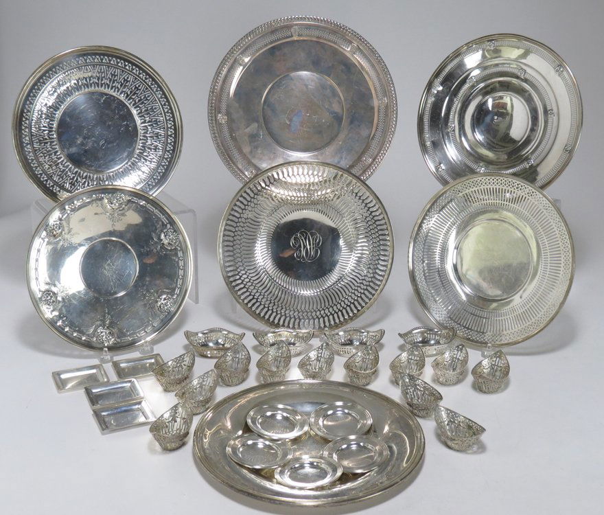 MISCELLANEOUS LOT OF STERLING SILVER: (7) round trays, 9"; 11" diam.; (5) small various round trays, 3" diam.; (4) rectangular small various trays, 2.5"w; (16) oval pierced nut dishes, 3"w; 74 troy oz. total From