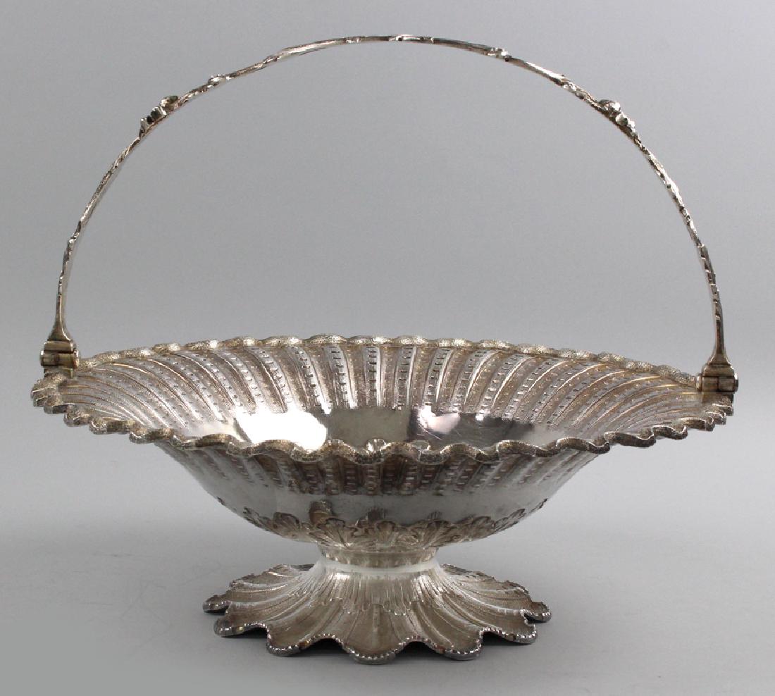 STERLING SILVER CAKE BASKET: maker: George Sharp, 1845 (matches the previous lot) retailed by Bailey & Co., Philadelphia/Chestnut St. Phila., 11.5"diam.; 34 troy oz. From a Newtown,