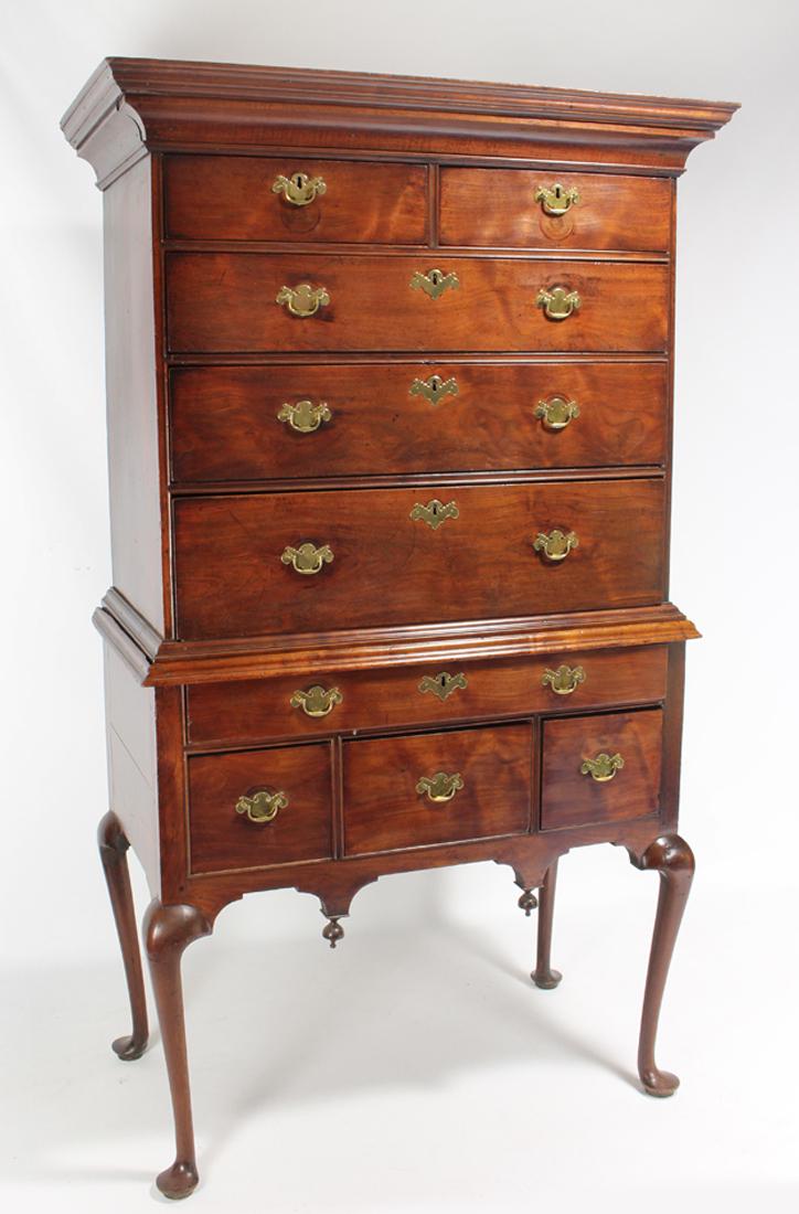 RHODE ISLAND QUEEN ANNE WALNUT HIGHBOY: two-part, flat-molded top with hidden drawer in molding, cabriole legs ending in pad feet, 71.5"h; bottom case, 37.5"w; 20.5"d