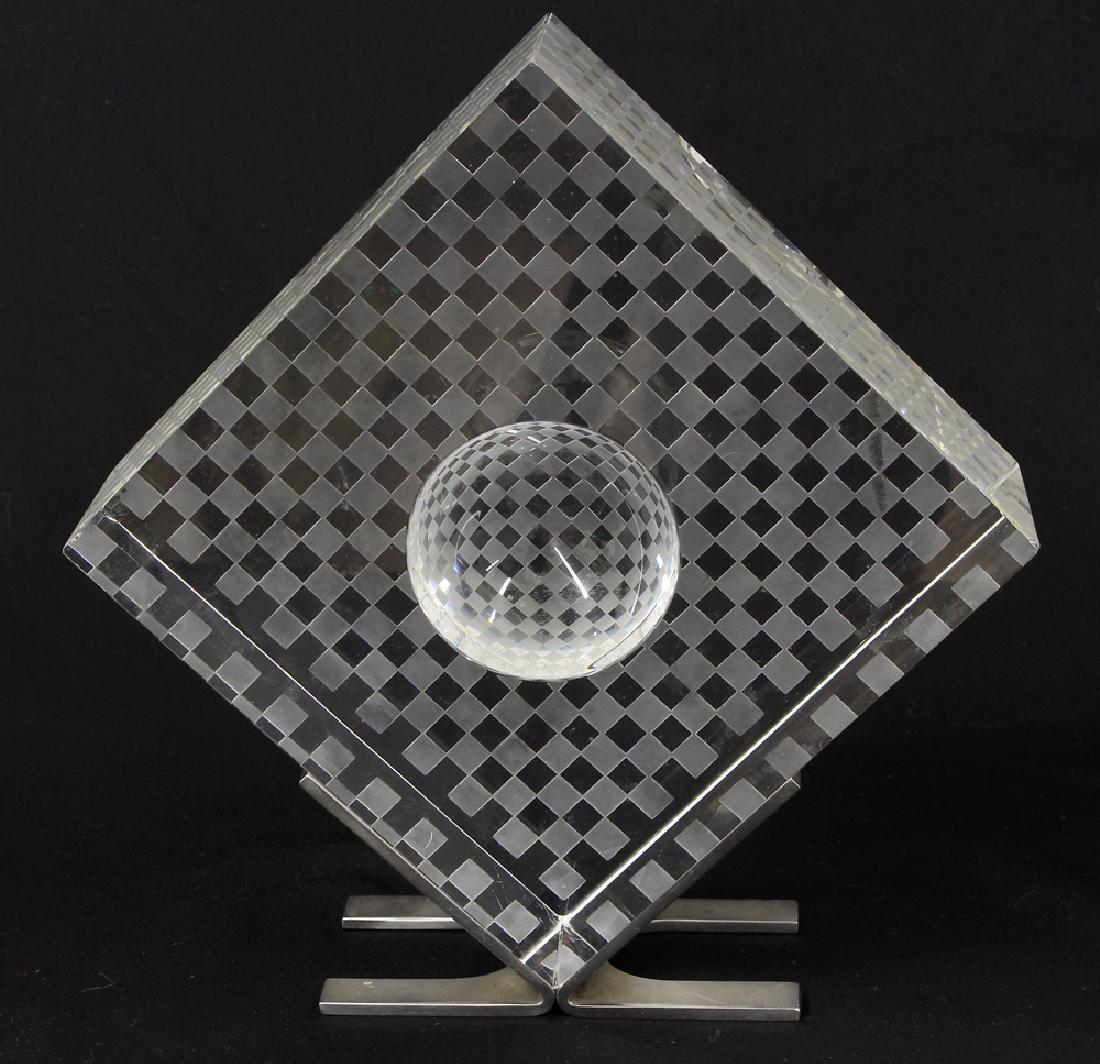 STEUBEN MID-CEN. MODERN GLASS SCULPTURE: Squares and Circles, designed by George Thompson the checkerboard block held upright on original stainless steel stand, 5.25"sq. This piece was introduced in 1969, discontinued in 1972. Thompson 