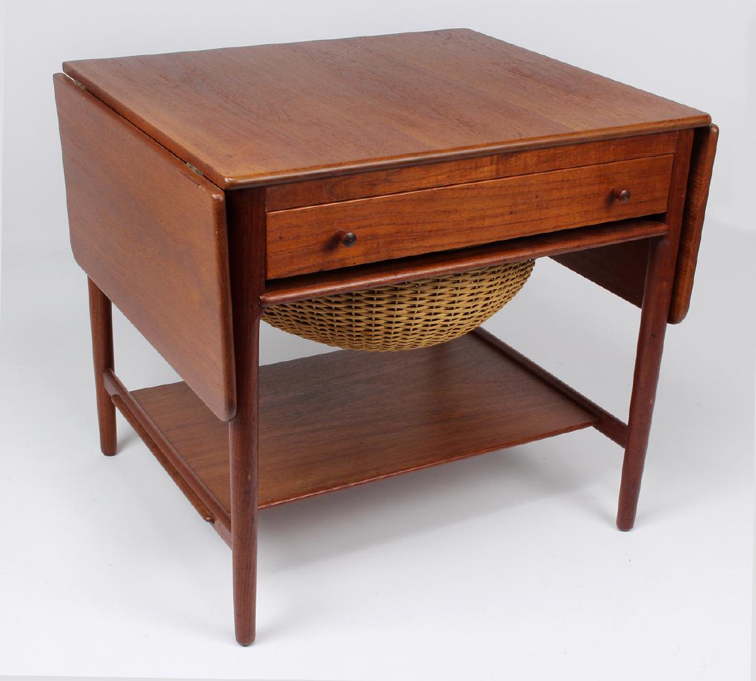 MID-CENTURY MODERN SEWING TABLE, WEGNER: signed under medial shelf, with drop leaves, drawer with fitted sewing compartments, slide with original basket, 23.75"h; 25.25"w; with 10.5"leaves; 22.5"d
