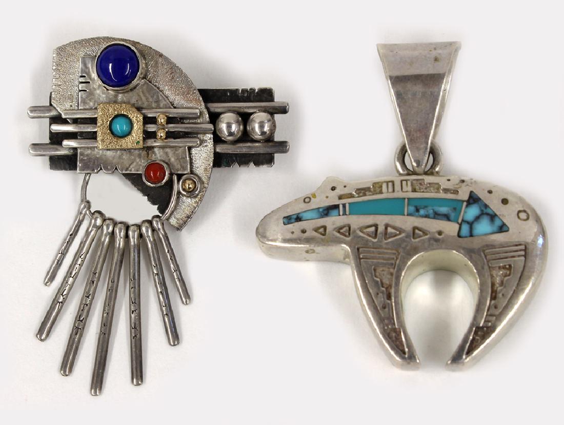 (2) CONTEMPORARY NAVAJO JEWELRY: a modernistic pin sgn. L. Eugene Nelson, silver and inset stones, 1.5"w; and a bear-form silver and inlaid turquoise pendant marked