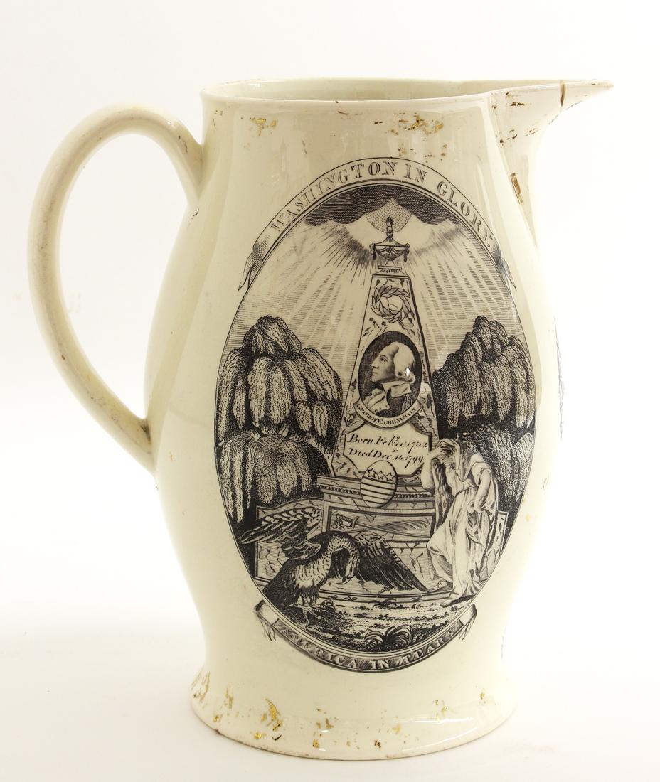 WASHINGTON COMMEMORATIVE LIVERPOOL CREAMWARE PITCHER: 18th c., polychrome transfer of the American ship FAME; oval transfer plaque commemorating the death of Washington on reverse, inscribed under spout