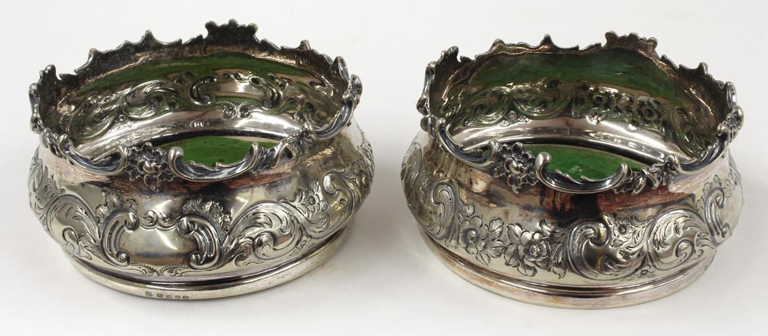 PAIR OF SHEFFIELD PLATED LARGE BOTTLE COASTERS: 1854, MH & Co. (Martin and Hall), 3"h; 6"diam. From the home of a Westwood, MA woman.