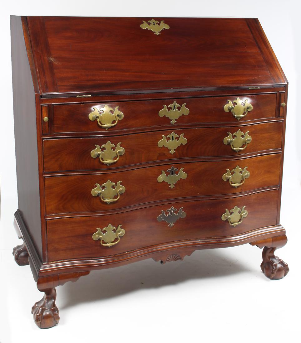 BOSTON CHIPPENDALE MAHOGANY OX-BOW DESK: fall-front, stepped and blocked interior, fan-carved drop panel, on large ball and claw feet, 45"h; 41"w; 22.5"d From the home of a prominent Brookline, Massachusetts gentleman, now mov