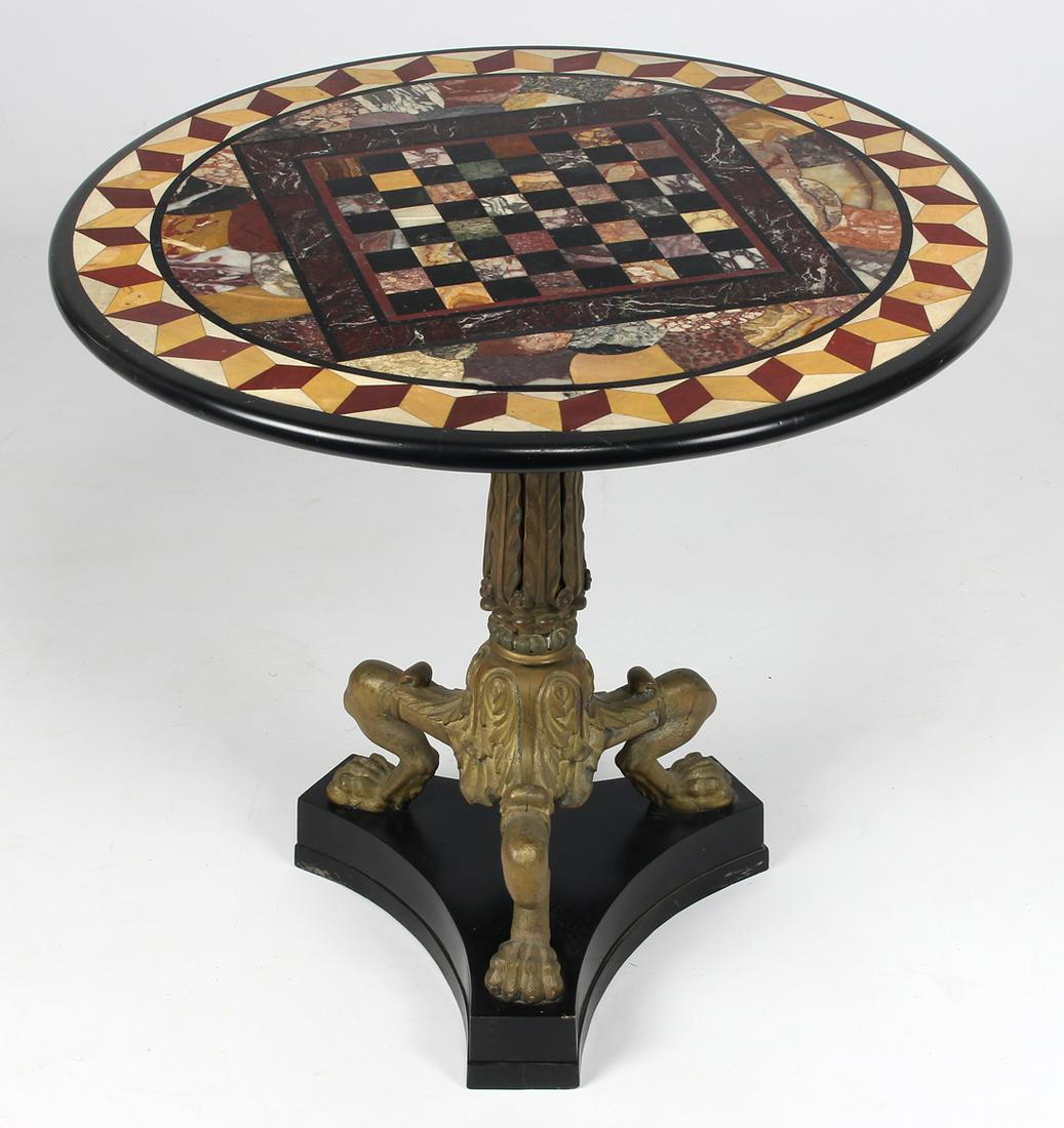 ITALIAN INLAID SPECIMEN AND MARBLE GAMES TABLE: 19th c. Grand Tour, round top, specimen game board bordered with optical geometric design, gilt bronze tripod base with lion paw feet mounted on marble base, 21"h; 22"diam.