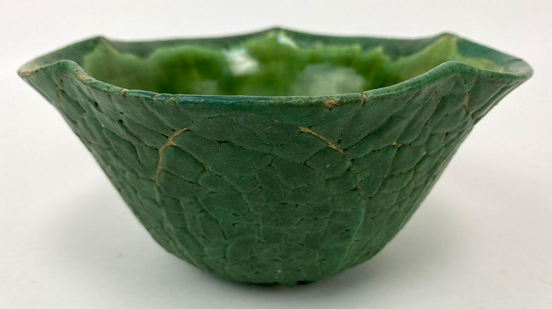 GRUEBY POTTERY SCALLOPED EDGE BOWL: incised mark on bottom, matte green 'elephant skin'glaze, 3.5"h; 7"diam.
