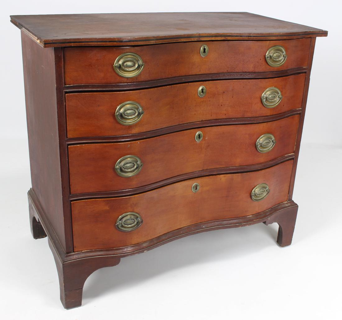 NEW HAMPSHIRE CHIPPENDALE MAPLE AND BIRCH OXBOW CHEST: old color, four graduated drawers with old oval embossed brass, original blocked feet, 34.25"h; 35"w; 19"d
