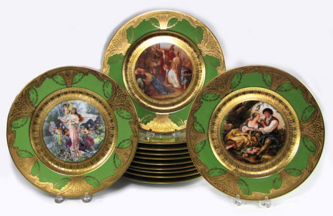 SET OF (12) LIMOGES HAND-PAINTED CABINET PLATES: green and raised gilded borders with various mythological scenes to center, (9) sgn. Hofman, (3) sgn. Kaufman. Marked with armorial gold seal ROYAL CHINA and red block letters LIMOGES FRENCH DECORATIO