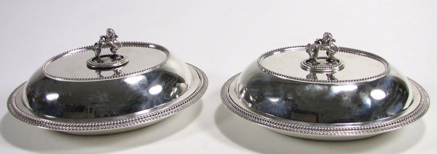 PAIR OF STERLING SILVER OVAL COVERED VEGETABLE DIS: marked: BALL, BLACK & CO., NEW YORK, 925/1000 one marked under side of rim, STARR MARCUS, top and bottom with bead and repeating scroll border, removable handle depicts lion rampant holding a shield 1