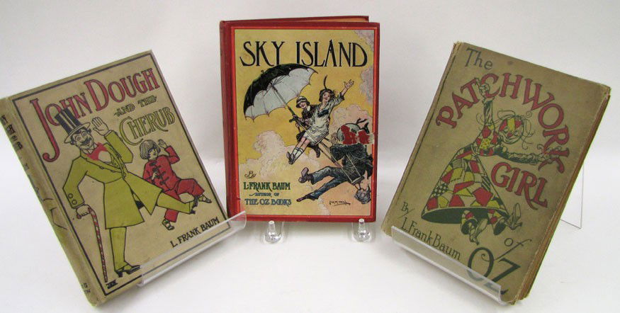 CHILDREN'S: (on 3) BAUM, L. FRANK: John Dough And The Cherub, 1906, Reilly & Britton, Chicago (good, edges rubbed); Sky Island, 1912, Reilly & Britton, Chicago (gouge in cover); The Patchwork Girl Of Oz, 1913, Reilly & Britton, Chicago