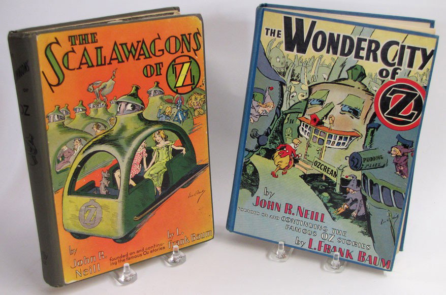 CHILDREN'S: (on 2) NEILL, JOHN R. : The Wonder City of Oz, 1940, Reilly & Lee, Chicago, 1st ed.; The Scalawagons of Oz, 1941, Reilly & Lee, Chicago; 8vo, color lithograph on cloth boards Prov.: collection of Henry Sigourney, Cambridge, 