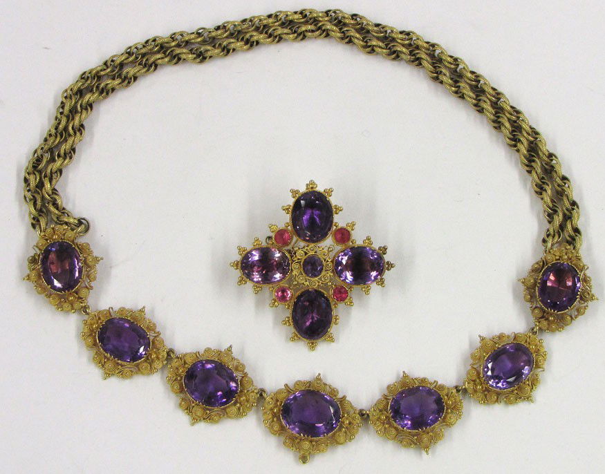 VICTORIAN GOLD AND AMETHYST NECKLACE AND PENDANT P: 10k necklace with (7) oval links in rich swirl filigree design, connected by 14k double open rope link necklace, 18"long; with matching (4) petal set pin with purple and rose paste amethyst, 2" sq. [5
