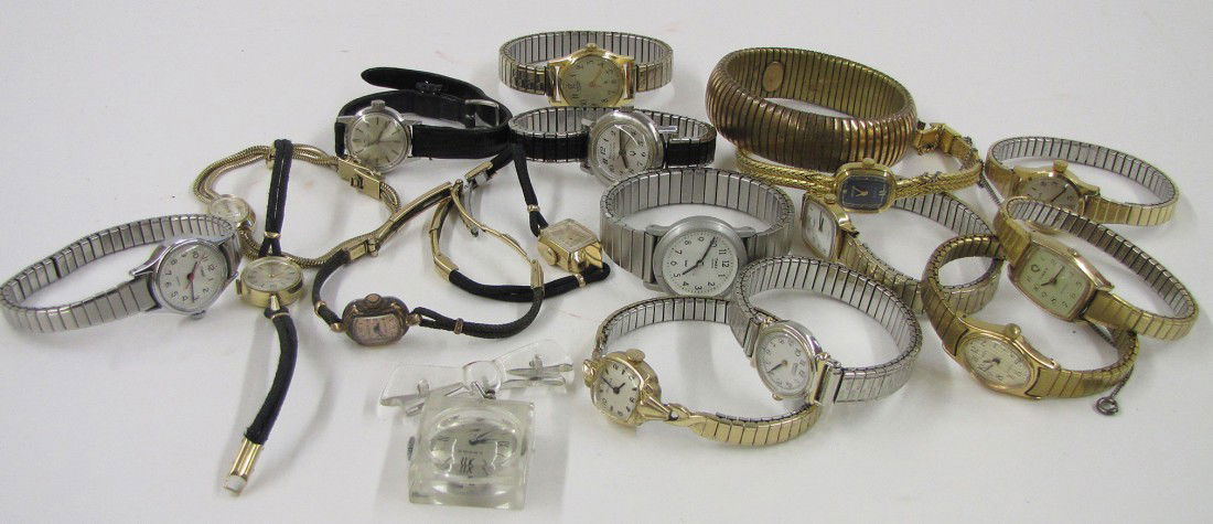 (on 18) LADIES: (16) various wrist watches, one with chord band by Tiffany & Co., the others by Gruen, Timex, Bulova, Seiko, Pulsar, Austin, Citizen, Movado; along with an acrylic pin watch; and a wrist band Estate o
