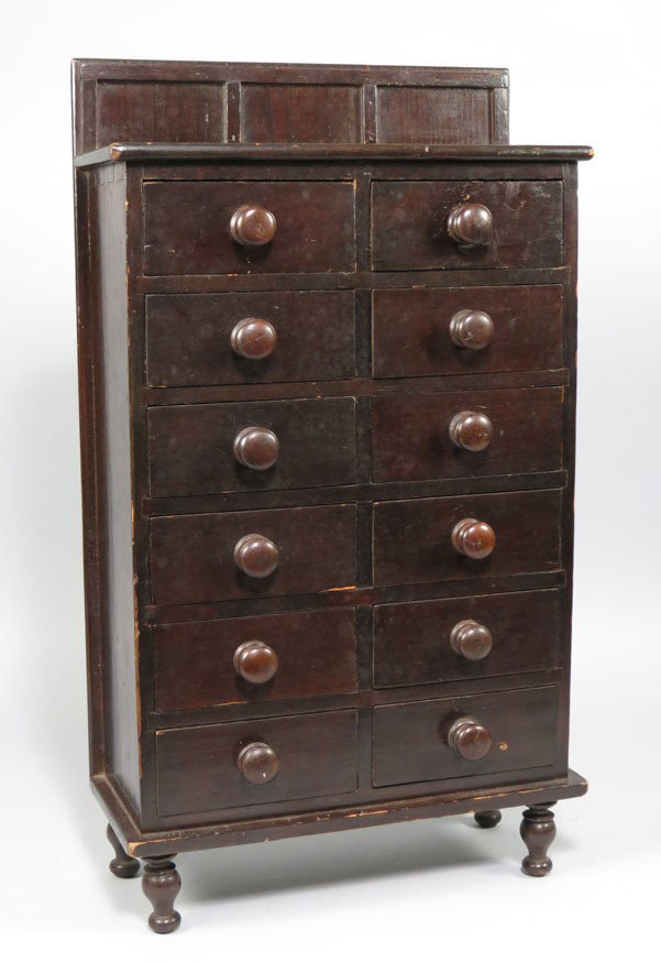 MINIATURE 19TH C. NEW ENGLAND PAINTED APOTHECARY C: paneled raised back-splash, molded top over (12) small drawers, on high turned feet, 22”h; 13”w; 5.25”d