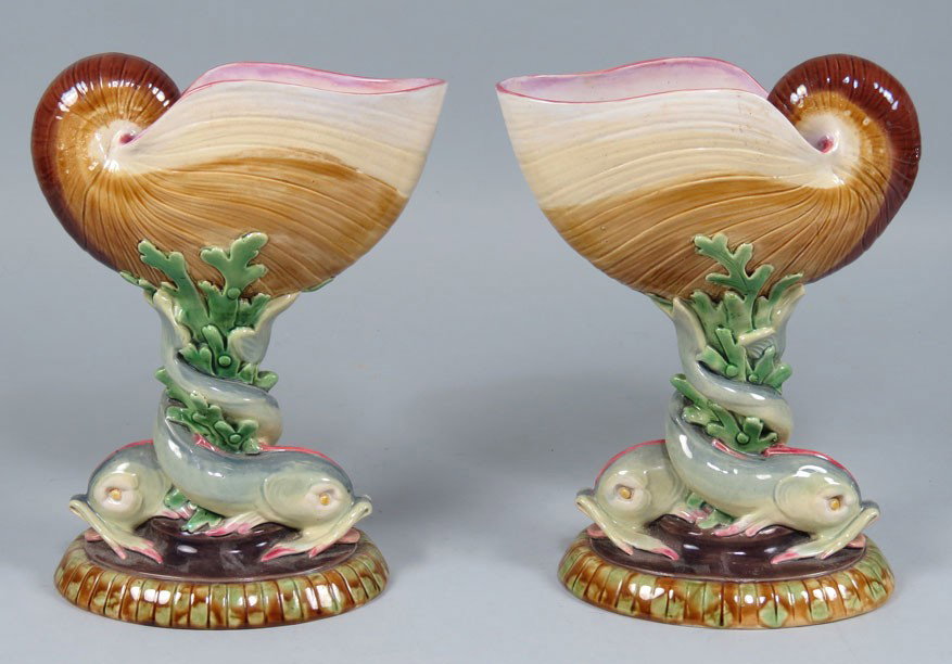 PAIR OF 19TH C. MINTON MAJOLICA SHELL-FORM COMPOTE: sgn. Minton, having double dolphin form oval bases 9”h; shell, 7”w; 3.25”d Prov: George Cravert Antiques, 122 Charles St., Boston, MA