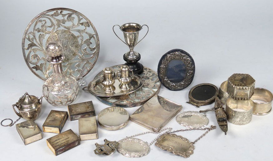 BOX LOT OF VARIOUS STERLING SMALL NOVELTY ITEMS: silver overlay perfume and coasters; (2) compacts; (4) napkin rings; (3) liquor labels; tea ball; miniature tray and pepper pots; (5) match cases; etc.