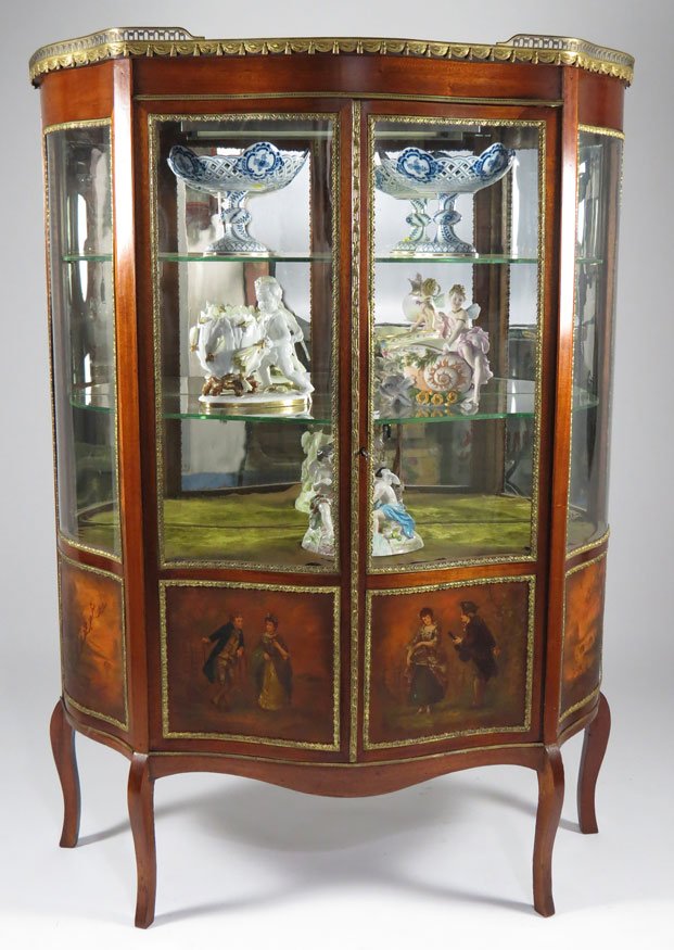 FRENCH ‘VERNIS MARTIN’ HAND-PAINTED VITRINE: brass gallery, curved glass sides, mirrored interior, the door painted with 18th c. couples, 59.5”h; 39”w; 15”d