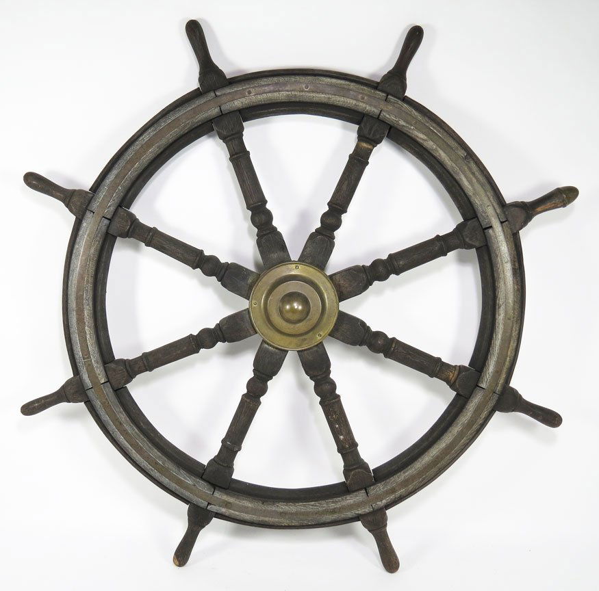 60" AMERICAN MARITIME SHIP’S WHEEL: 19th c., eight spokes with brass center Prov.: the collection of television personality Rex Trailer, host of the Boston-based, Saturday morning children’s show Boomtown, which aired from 1956-1974.