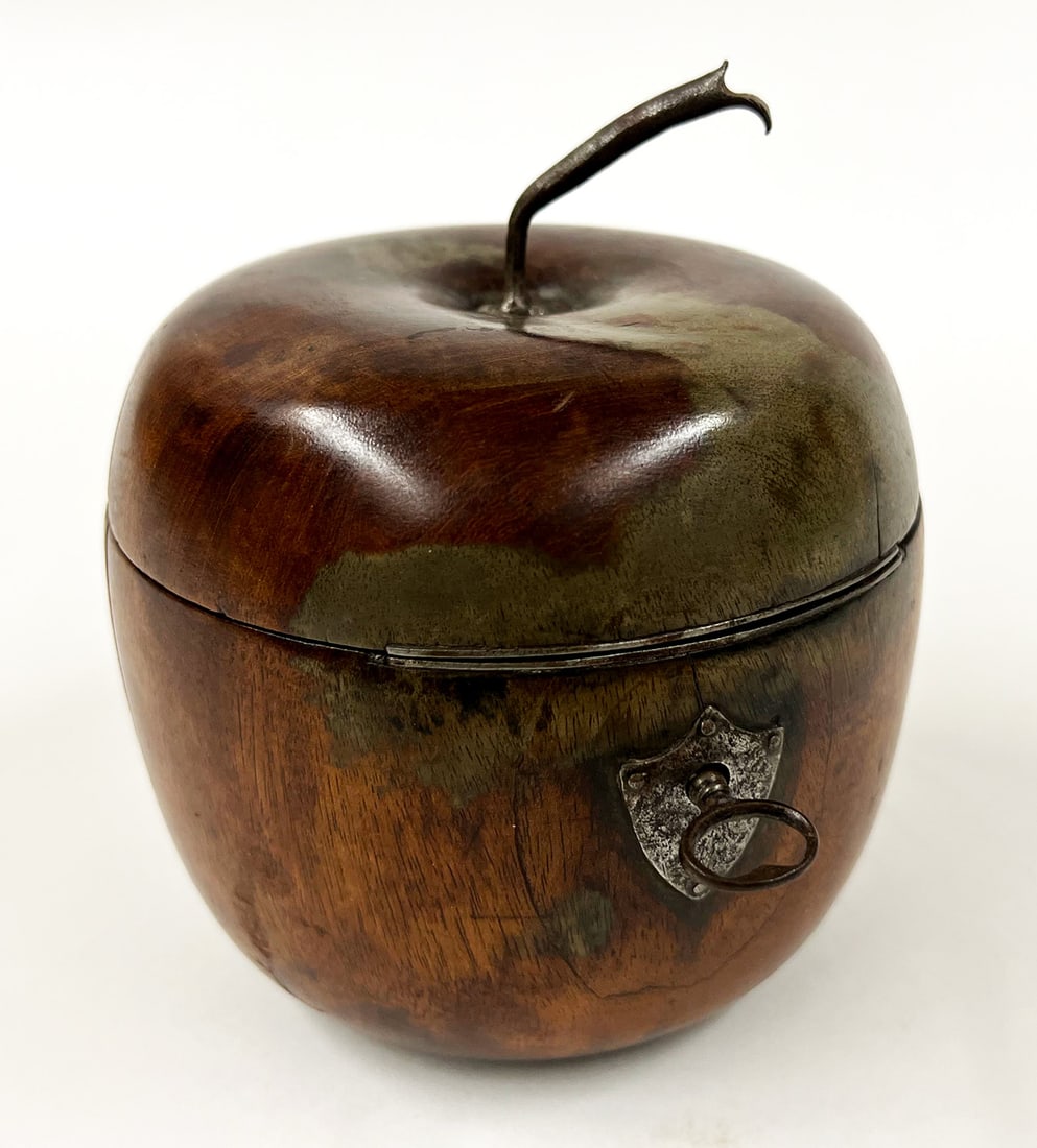 ENGLISH GEORGIAN APPLE-FORM TEA CADDY: 1790-1800, original metal stem; silver paper lined interior; with key; 5"h; 4.5"diam. NOTE: Apologies, we cannot approve bidders during the auction.