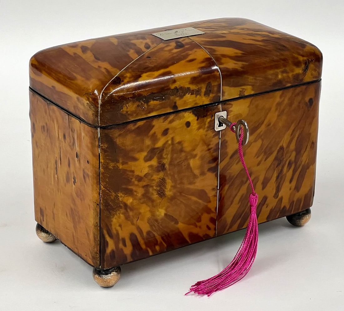 ENGLISH GEORGIAN DOUBLE TEA CADDY: rectangular-form with rounded corners; double lidded interior, metal ball feet; silver escutcheon and lid plaque inscribed in script La reconnoisiance /1825; 5.75"h