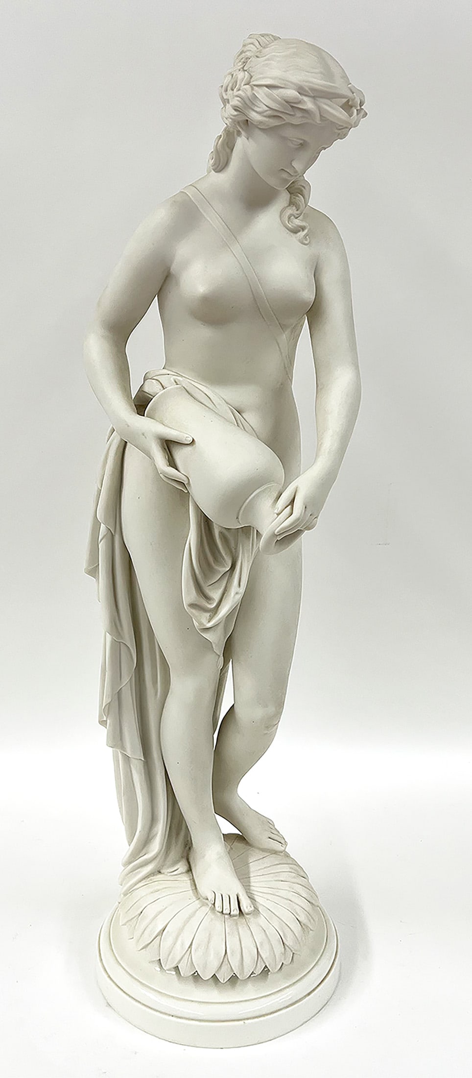DECORATIVE PARIAN FIGURE, VENUS BATHING: figure 29"h; mounted on 2" round porcelain base (not original, marked Minton) NOTE: Apologies, we cannot approve bidders during the auction.