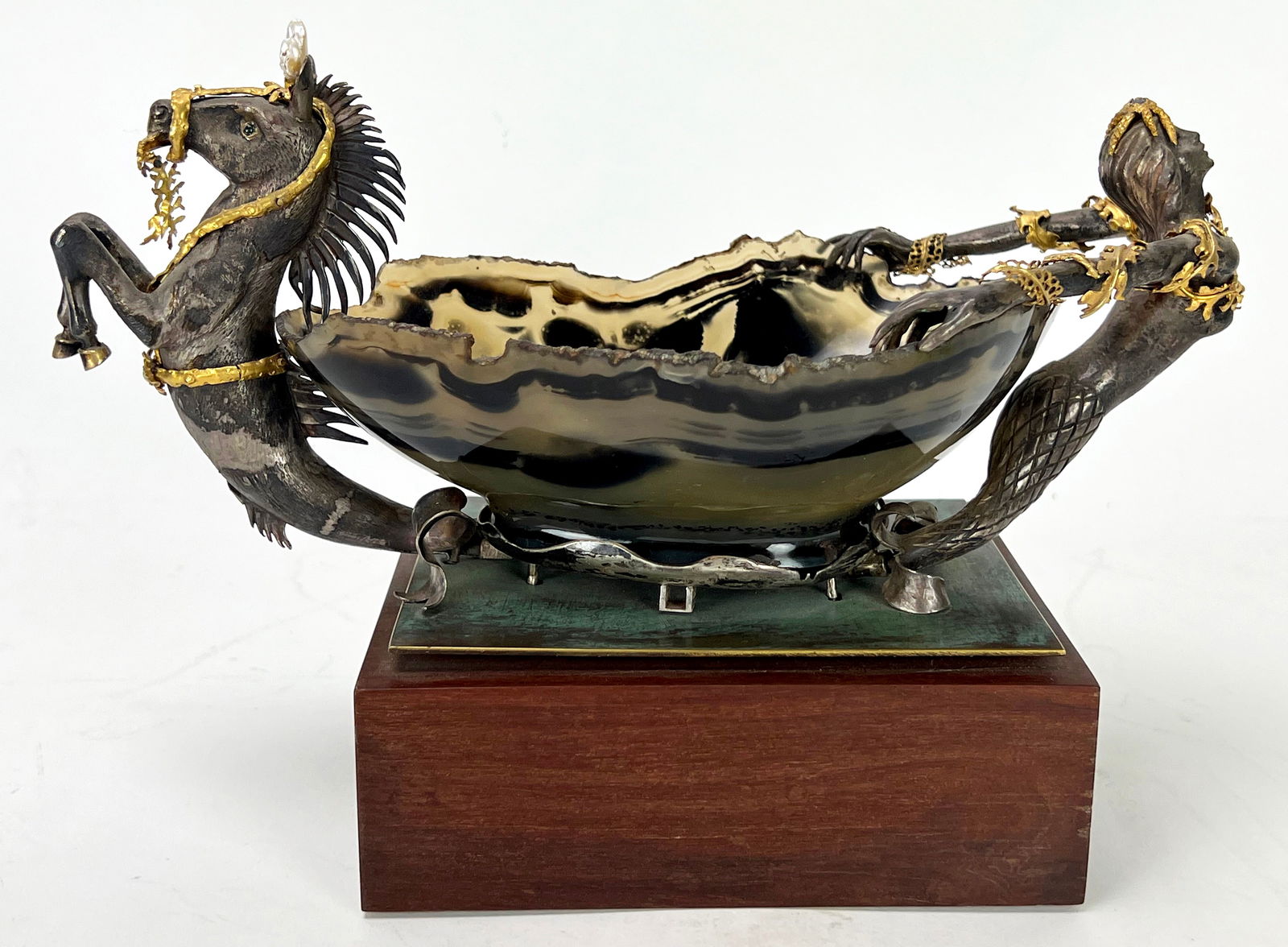 LOUIS FERON (French/American, 1901-1998) SCULPTURE: initialed on the seahorse's tail LF; oval, shaped agate bowl supported at one end by a silver mermaid with gold embellishments and at the other end a seahorse with gold h