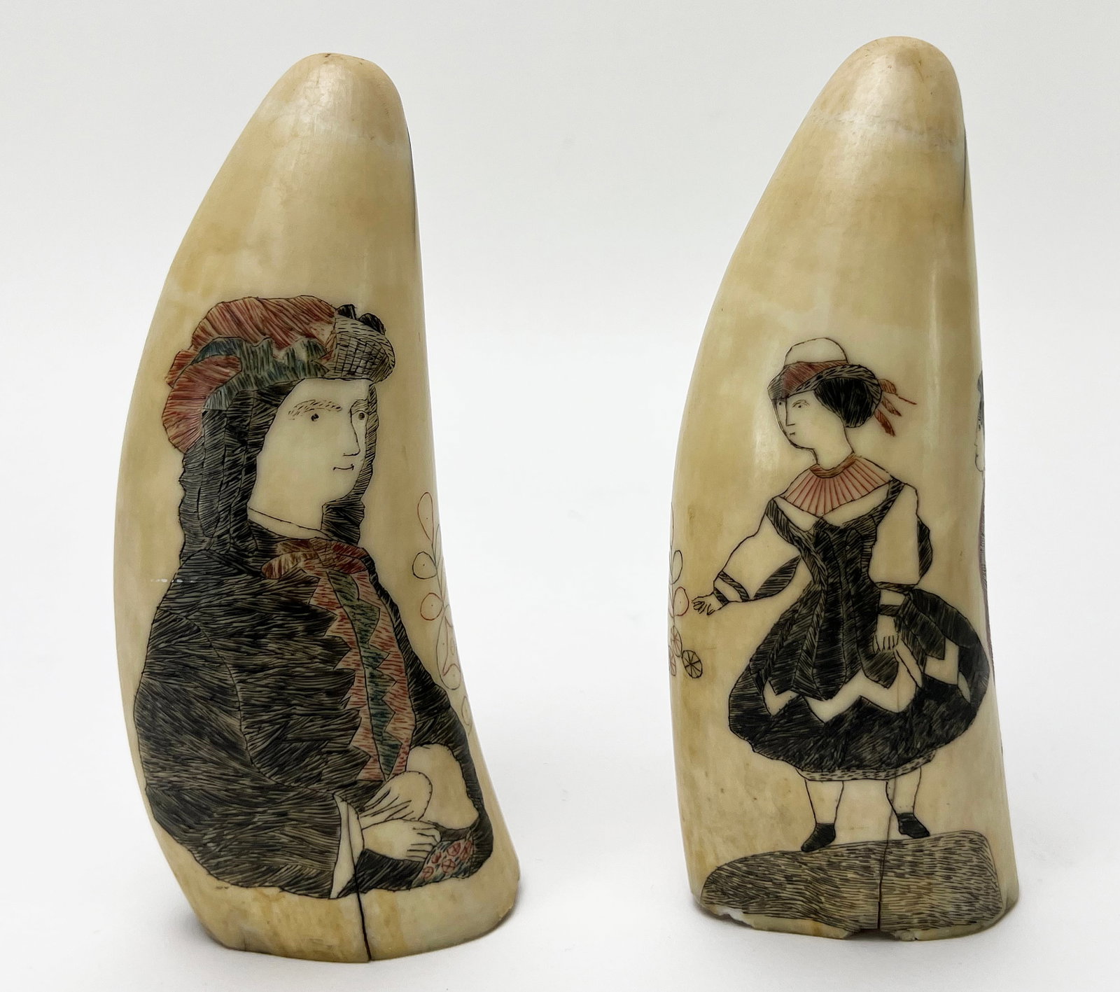 (2) 19TH C. SCRIMSHAWED WHALE'S TEETH: decorated on one side, each with red coloring enhancements; one depicting a full-bodied girl and smaller boy to her side, 6"; the other with a half portrait of a woman wearing a hat, 6" Similar side d