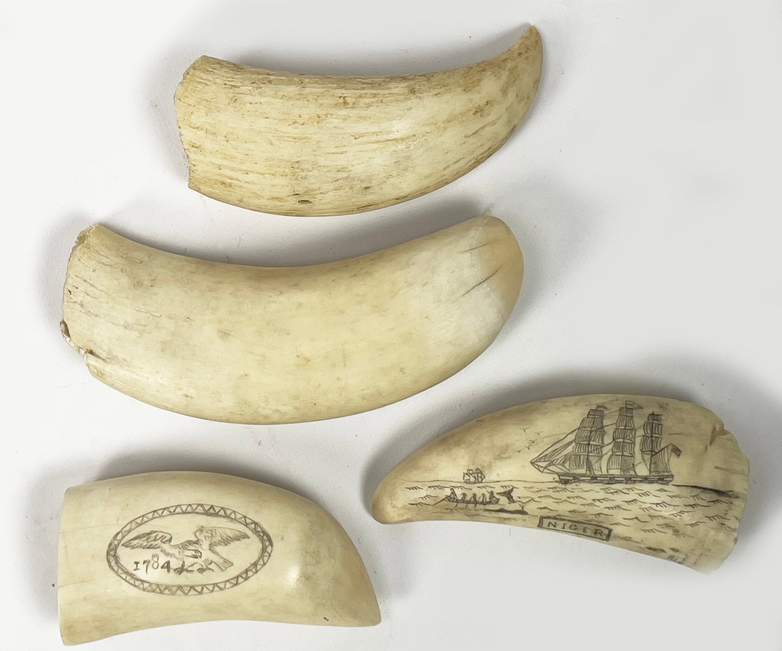(on 4) 19TH C. SCRIMSHAW WHALE TEETH: a small tooth depicting a whaling scene engraved Niger and initialed RLH; the reverse inscribed