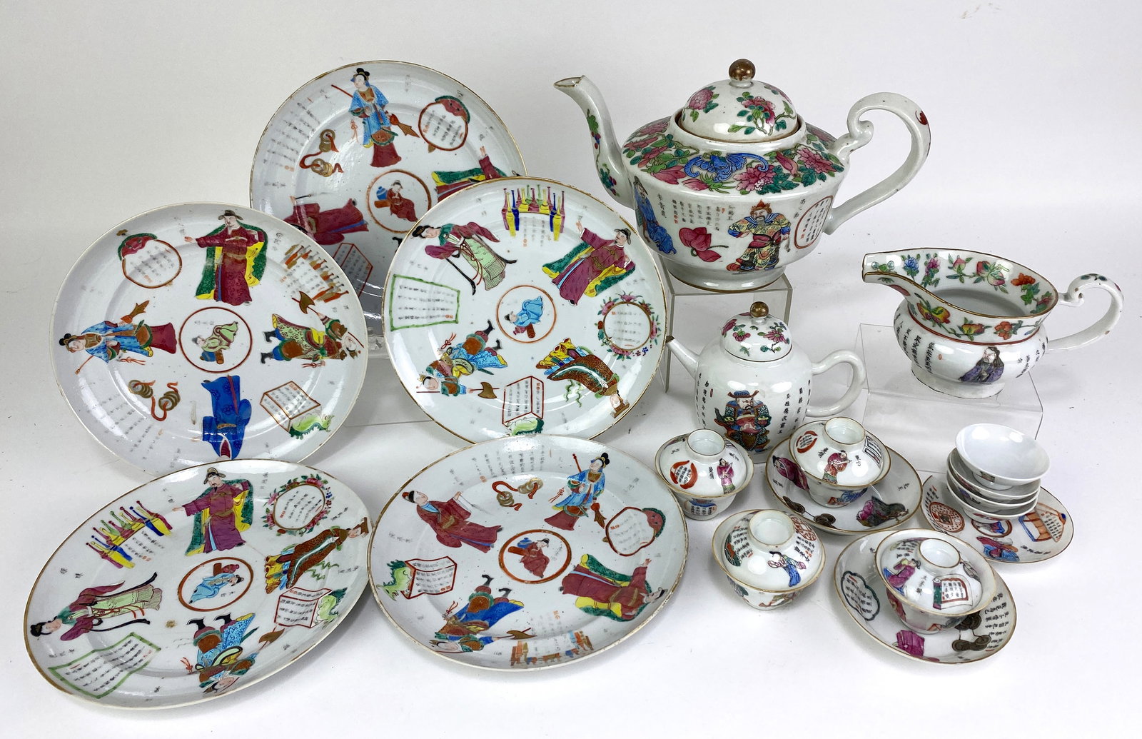(on 19) CHINESE EXPORT PORCELAIN TEA SERVICE PIECES: with figural and calligraphy decoration including: (5) plates, 8" (three with small rim chips, one with hairline); a large footed teapot; a small teapot; a creamer; (