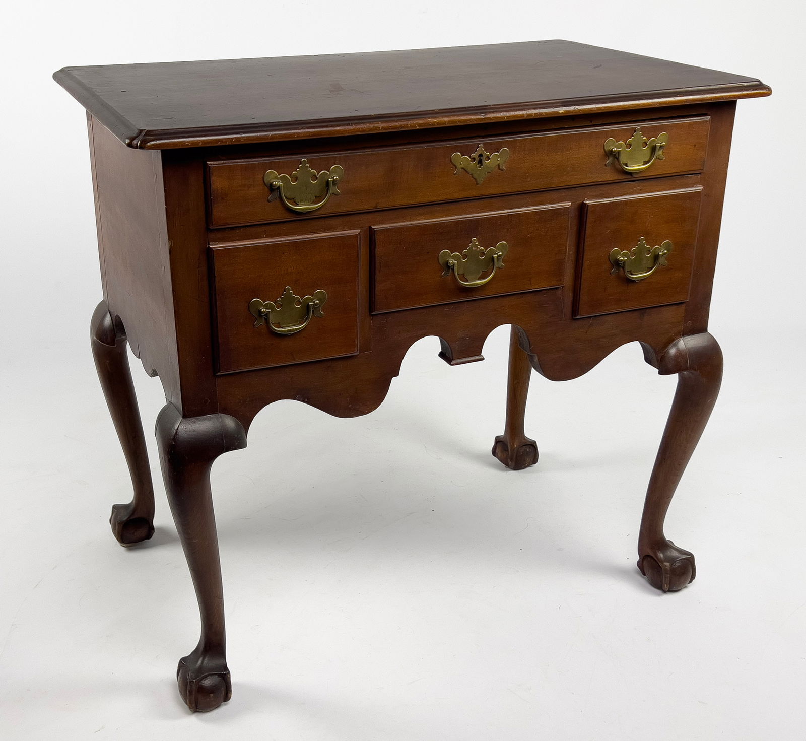 18TH C. NEW ENGLAND CHIPPENDALE DRESSING TABLE: maple or cherry with mahogany wash,; long drawer over three; cabriole legs ending in ball and claw feet; 31.5"h; 31.5"w; 20.5"dNOTE: Apologies, we cannot approve bidders during the auction.