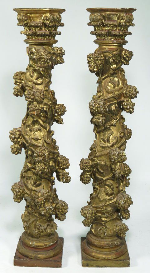 PAIR OF 18TH C. ITALIAN CARVED AND GILT GESSO PEDE: shaped top above a Corinthian capital, the post entwined with vines and grape clusters, on square base, 49”h