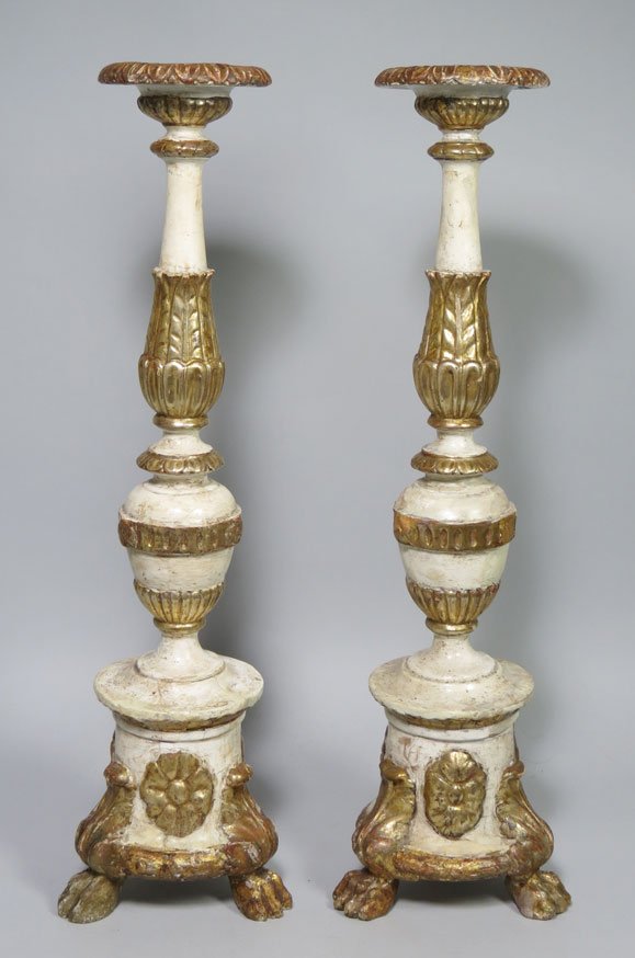 PAIR OF 18TH C. ITALIAN CARVED PRICKET STICKS: polychromed white and gold, on gilt paw feet, 29”h