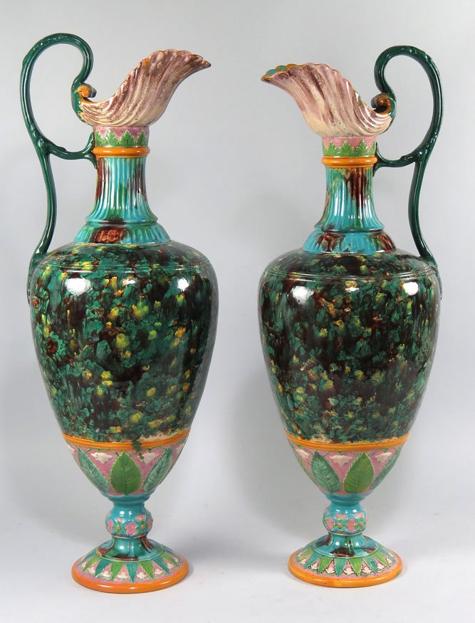LARGE PAIR OF MAJOLICA FOOTED EWERS: prob. Minton, 25.5”h